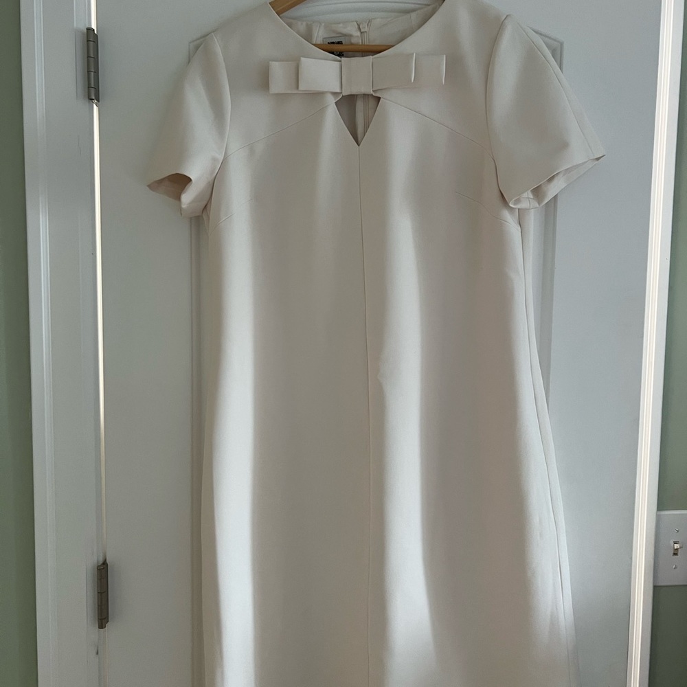 Elegant Cream Dress with Bow Detail